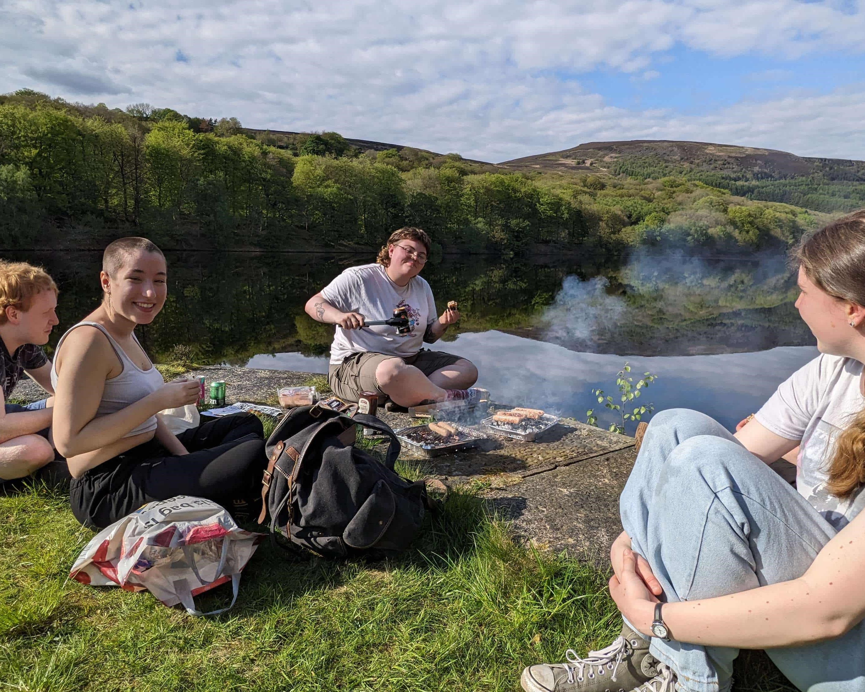 4 people having a BBQ in the peak district