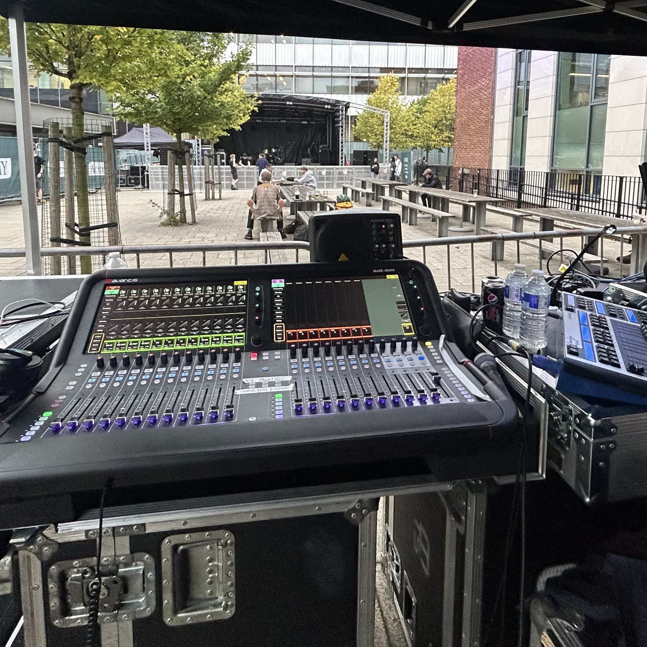 Light and audio desks at the front of house of Alive! fest